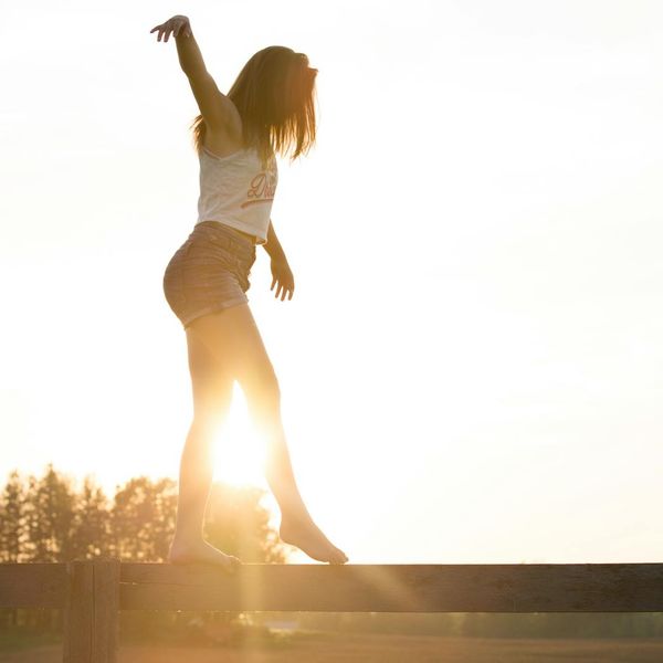 Silhouette of a person at sunrise, symbolizing mental clarity and a fresh start.